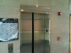 Shows the elevator within the doghouse, there are also stairs.